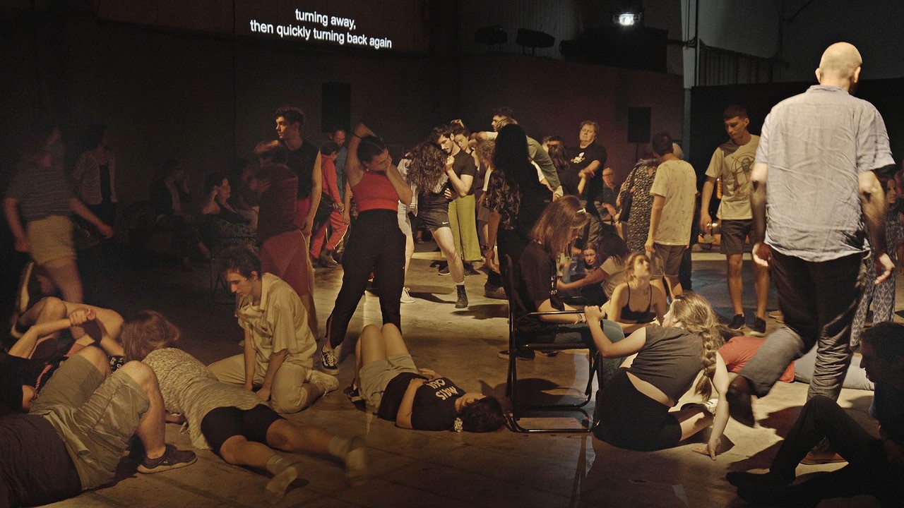 Group of people engaged in Michael Kliën's theatre/dance workshop Laboratory for Social Choreography